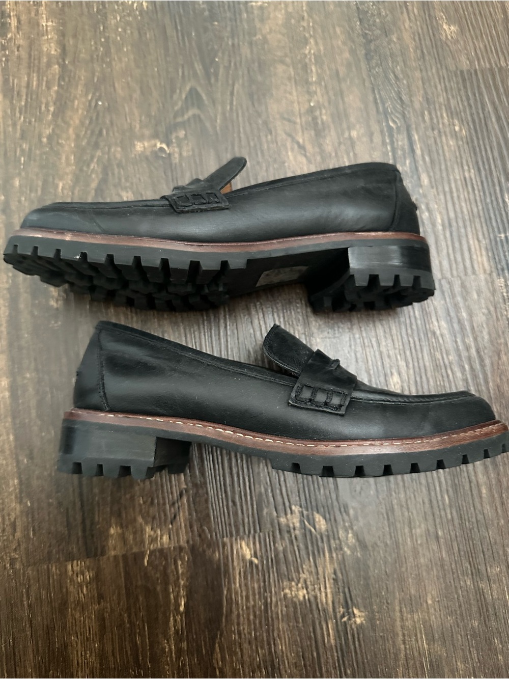Women’s Black Leather Lug Sole Penny Loafers